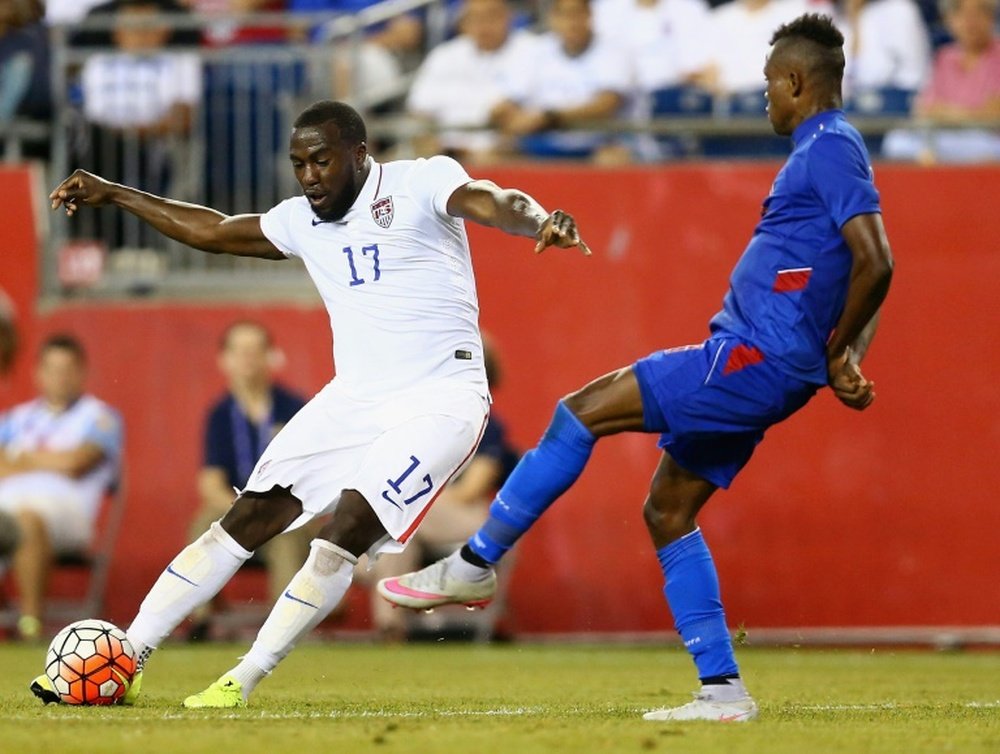 Wilde-Donald Guerrier 7 of Haiti defends Jozy Altidore 17 of United States during the 2015 CONCACAF Gold Cup Group A match on July 10, 2015 in Foxboro, Massachusetts