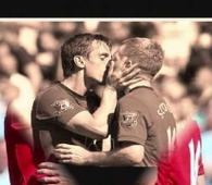 Gay neville kisses Paul scholes