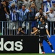 Los aficionados del Málaga celebran el primer gol de Isco ante el Zenit
