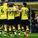Los jugadores del Borussia Dortmund celebran uno de los goles ante el Ausburgo