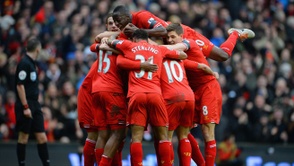 Los jugadores del Liverpool celebran uno de sus goles ante el Arsenal