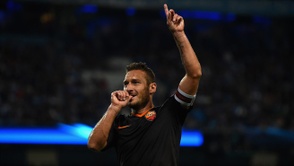 Totti celebra su gol ante el Manchester City