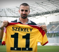 J. Székely  