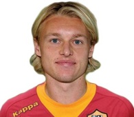 S. Kjaer