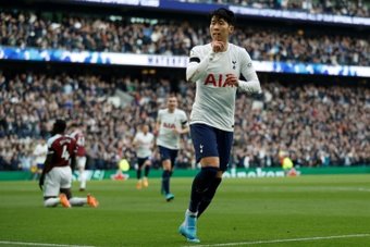 Son celebrates in Spurs' win. AFP