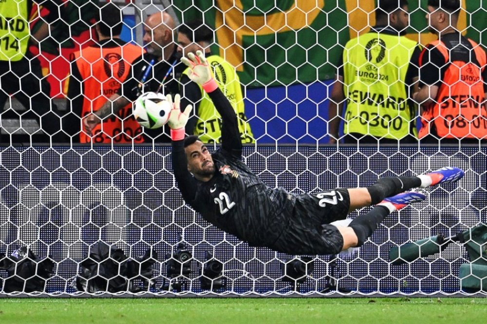 Costa produced three saves to thwart Slovenia's three takers. AFP