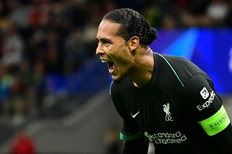 Van Dijk scored as Liverpool bounced back to win 3-1 in San Siro. AFP