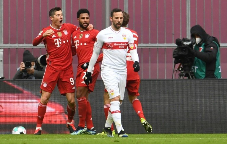 Lewandowski hits hat-trick as 10-man Bayern thump Stuttgart