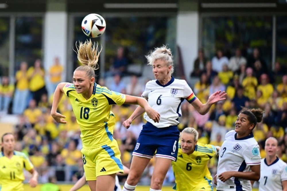 England battled to a 0-0 draw against Sweden to qualify. AFP