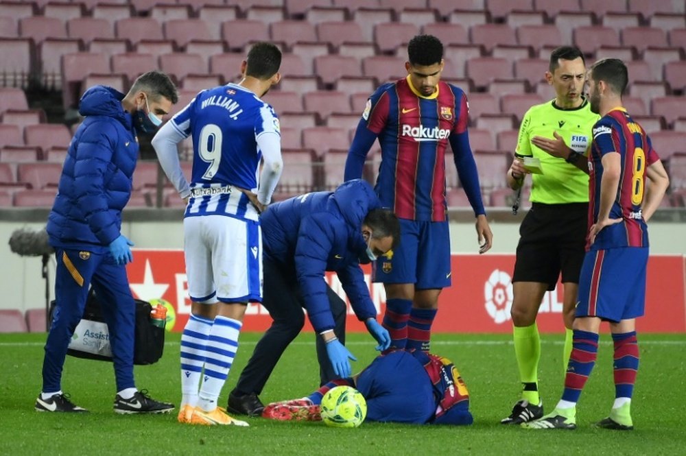 Barcelona fight back to reignite title bid. AFP