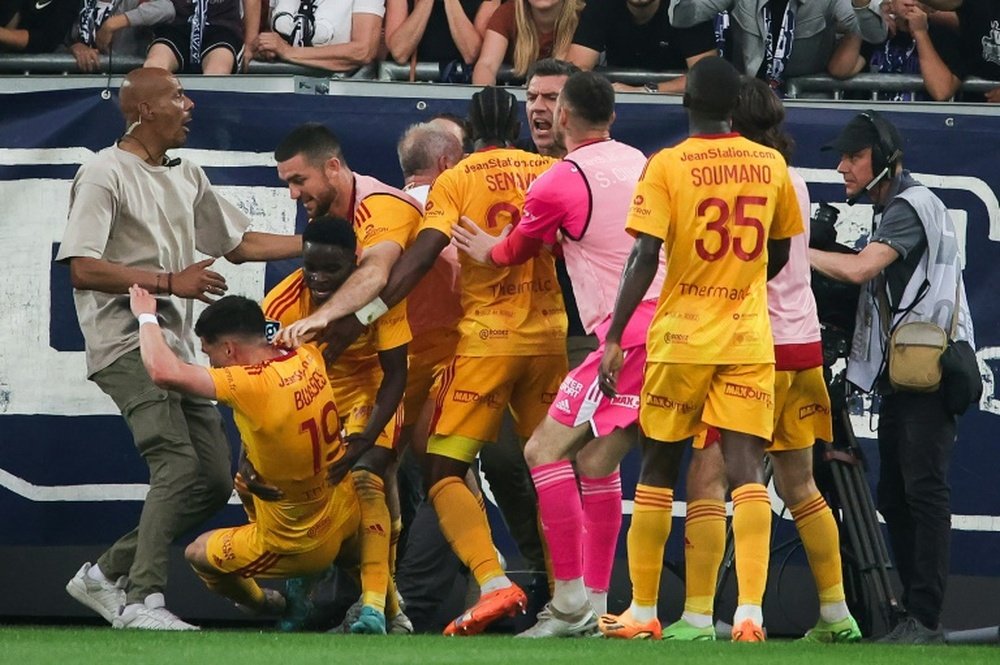Lucas Buades was pushed over by a fan. AFP