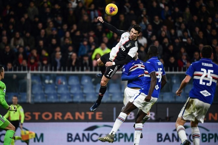 Flying Ronaldo fires Juve top as Buffon equals Maldini's Serie A record