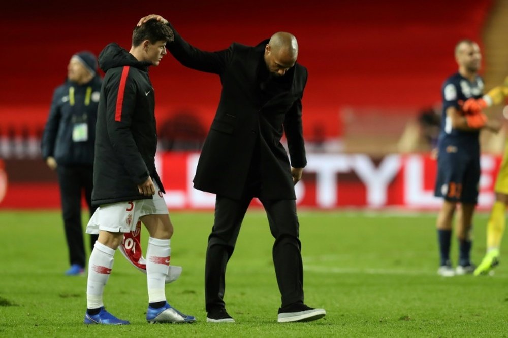 Henry consoled his players at the end of a defeat to Montpellier that he said was a disaster. AFP