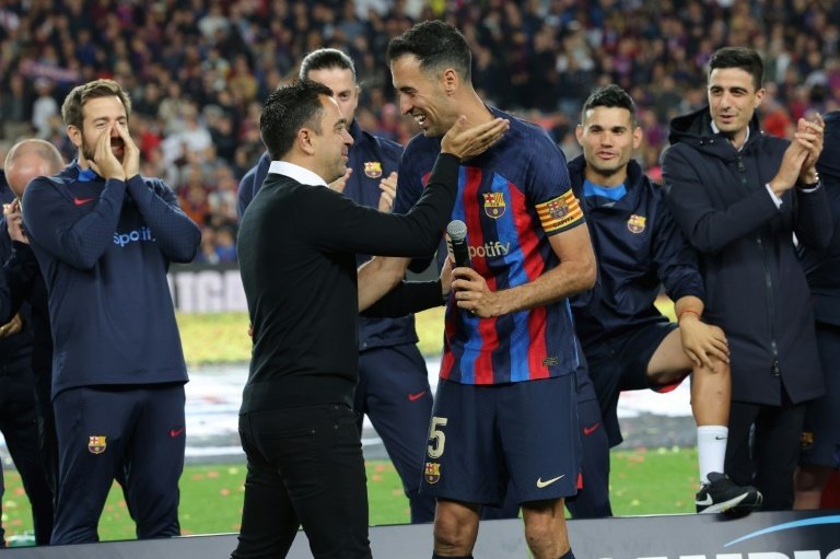 Xavi wants someone of equal quality to Busquets. AFP