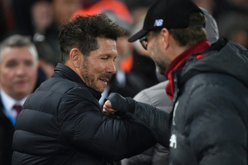 Jurgen Klopp and Diego Simeone are preparing to go head-to-head in the Champions League again. AFP