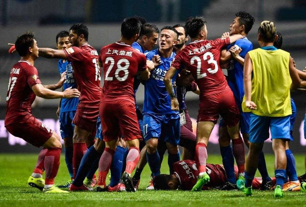 Chinese fans feel too harshly punished by their FA. AFP