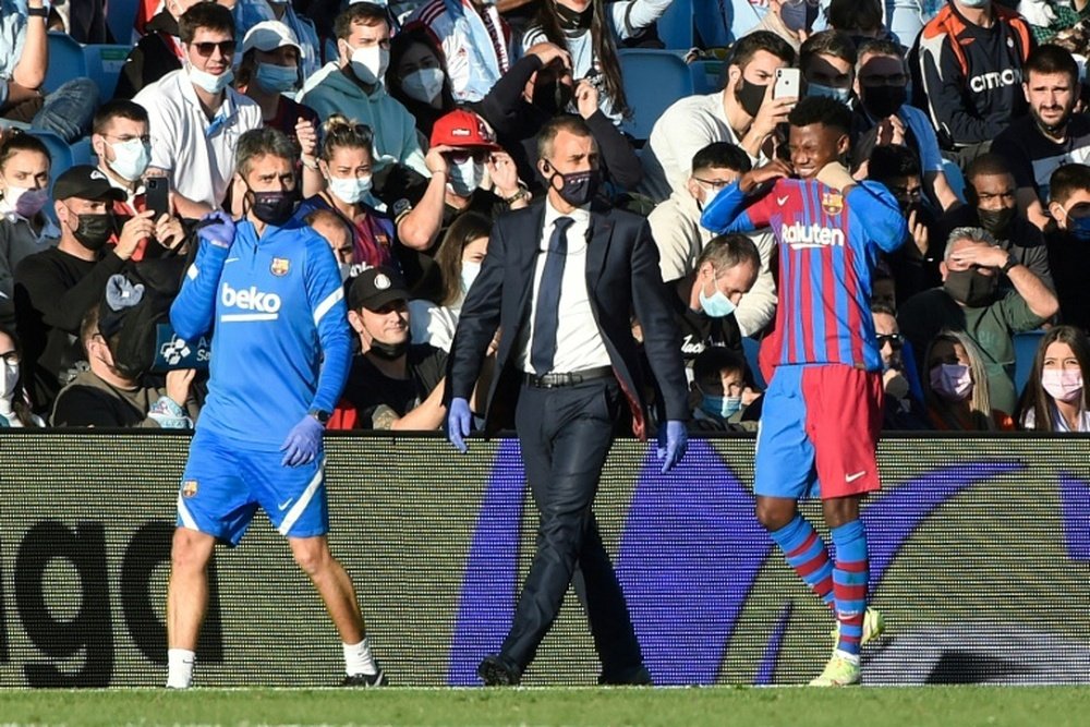 Ansu Fati (R) went off injured as Barca drew 3-3 ahead of Xavi's arrival. AFP