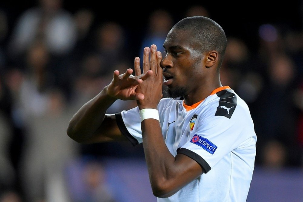 Kondogbia scored as Valencia came from behind to put four past Lille. AFP