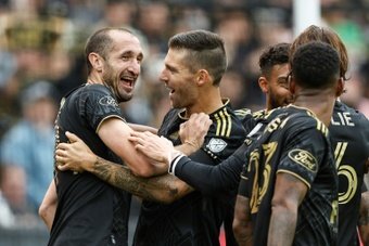 Former Italy captain Giorgio Chiellini scored his first goal in Major League Soccer as defending champions Los Angeles FC survived a late rally from the Portland Timbers to hold on and win their opening game of the season 3-2.