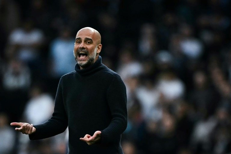 Guardiola is aiming to secure a sixth Premier League title. AFP