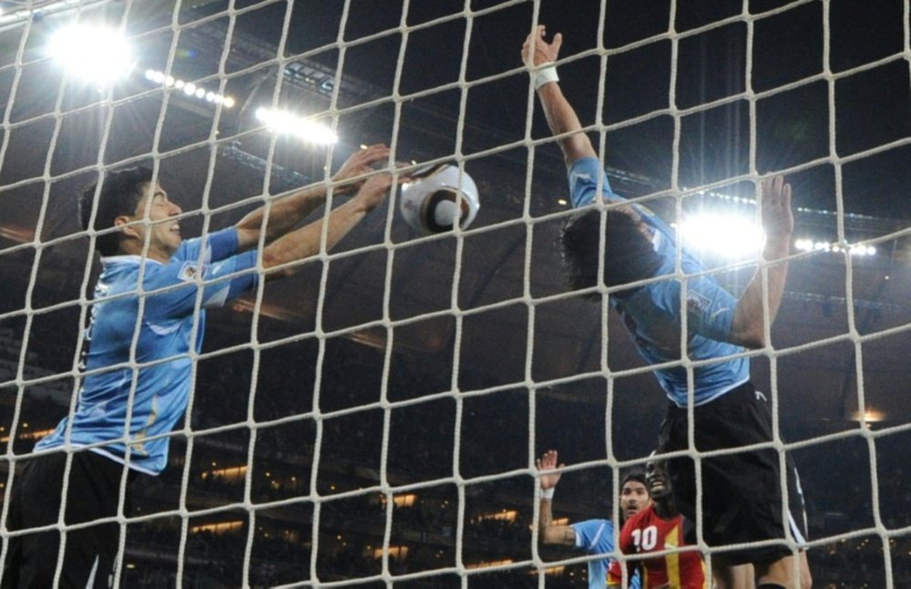 Ghana fans are not forgetting Luis Suarez. AFP