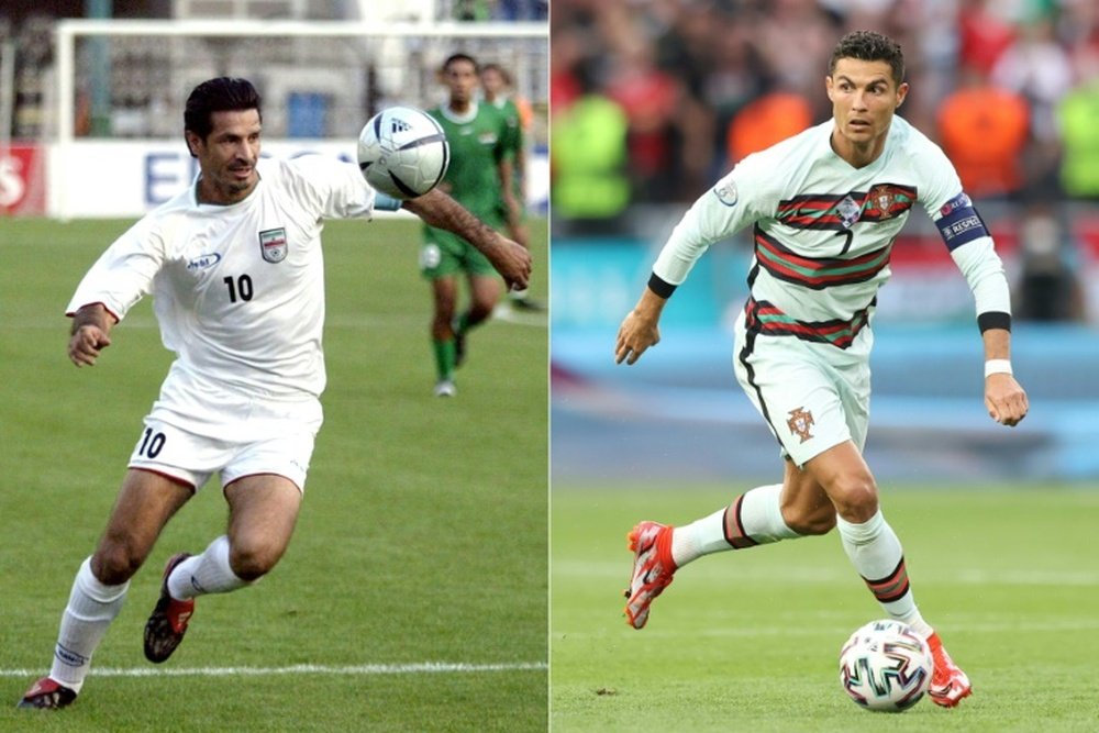 Daei (L) could well see his international scoring record beaten by Cristiano Ronaldo. AFP