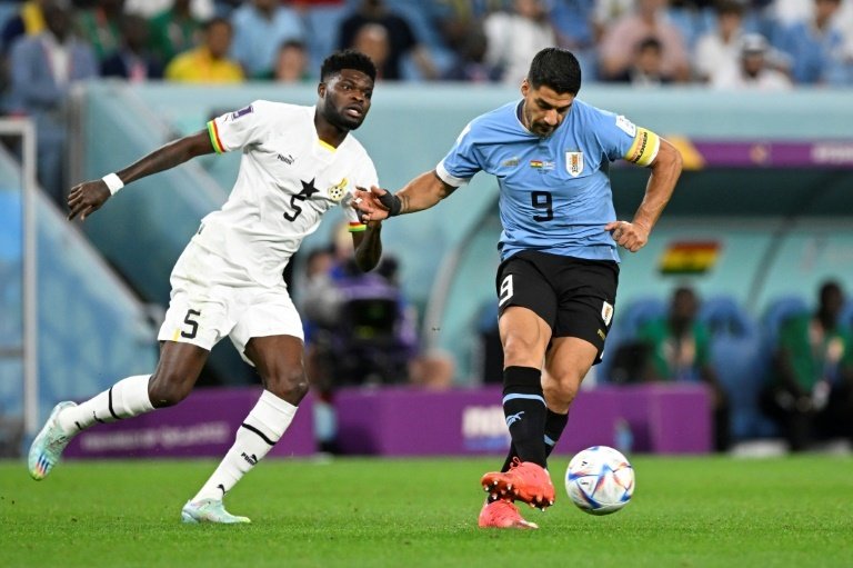 Thomas Partey (L) was among five Premier League stars who started for Ghana. AFP