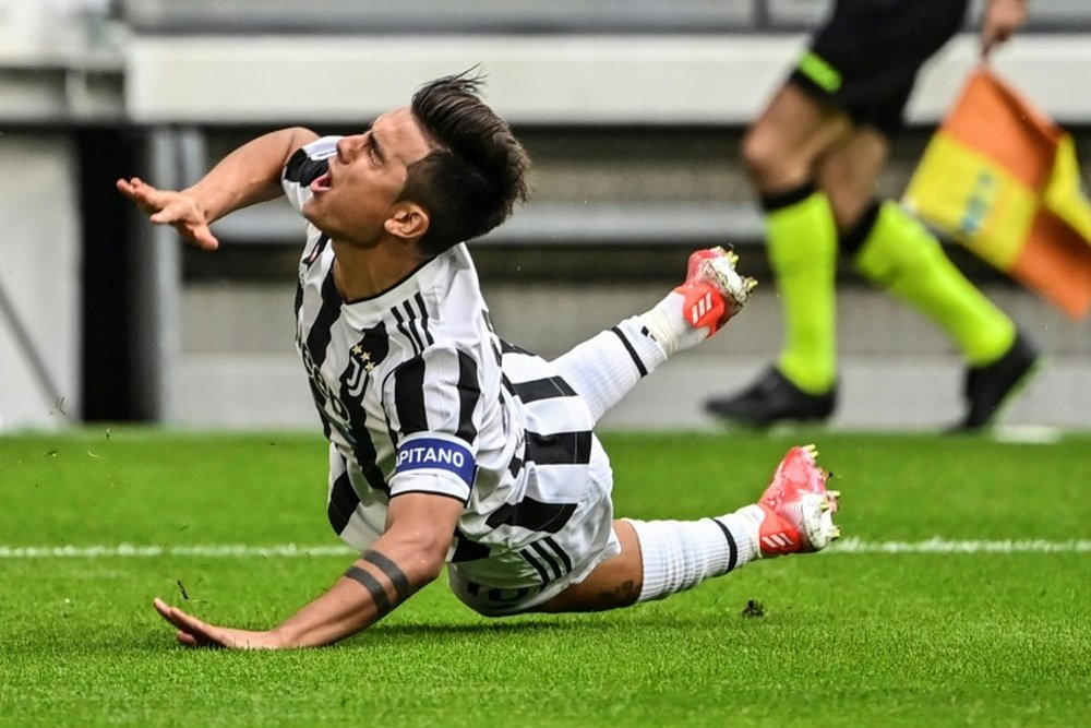 Paulo Dybala's injury overshadowed Juventus' victory over Chelsea. AFP