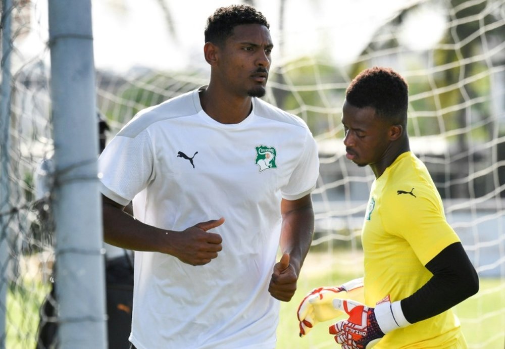 Sebastien Haller (C) has been diagnosed with a testicular tumour. AFP