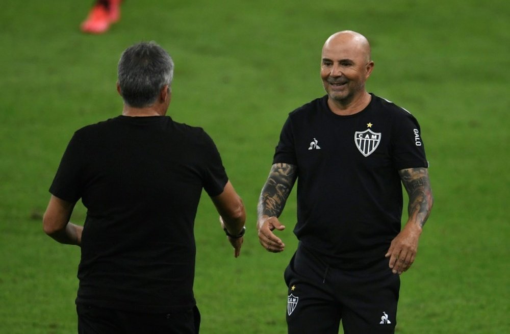 Jorge Sampaoli (R) is set to replace Andre Villas-Boas at Marseille. AFP