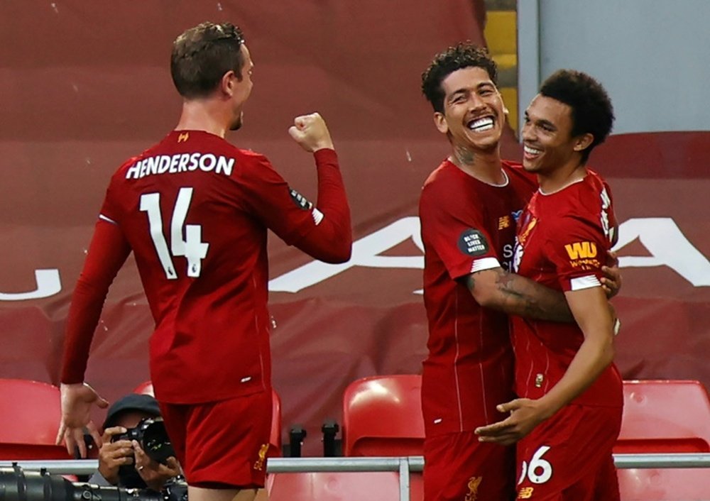 Liverpool title not possible without Klopp, says captain Henderson. AFP