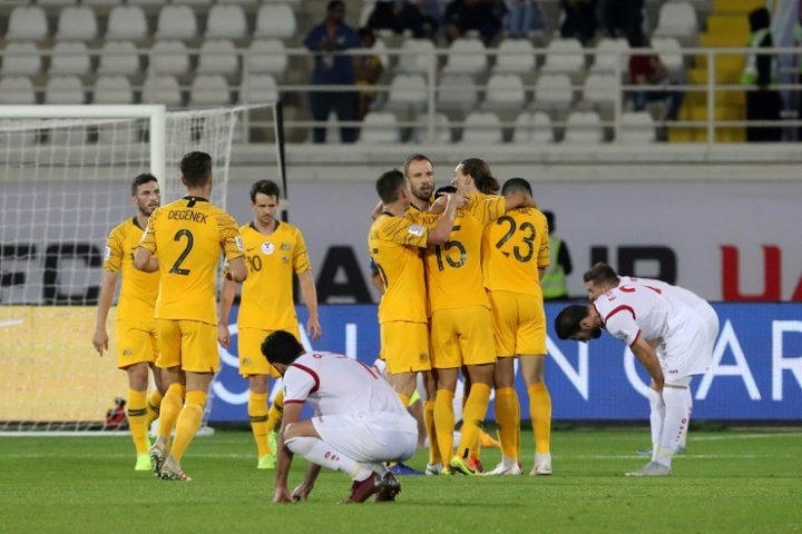 Late winner as 'helter-skelter' Australia down Syria to go through