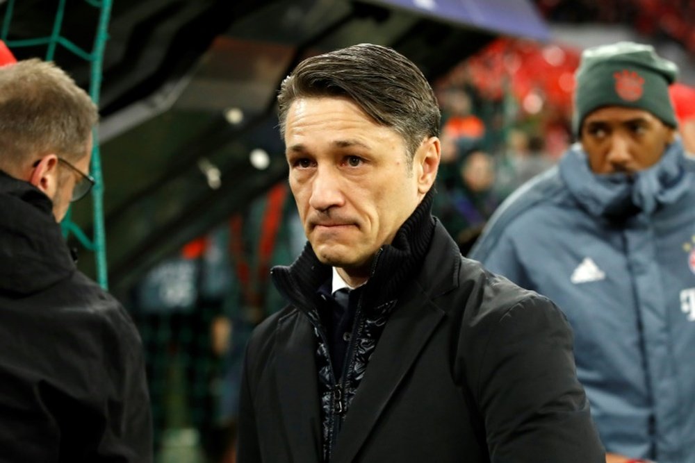 Glum Bayern boss Kovac eyes domestic double after European exit. AFP