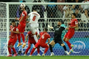 Iran will meet pre-tournament favourites Japan in the Asian Cup quarter-finals after surviving extra time with 10 men before defeating Syria 5-3 on penalties on Wednesday.