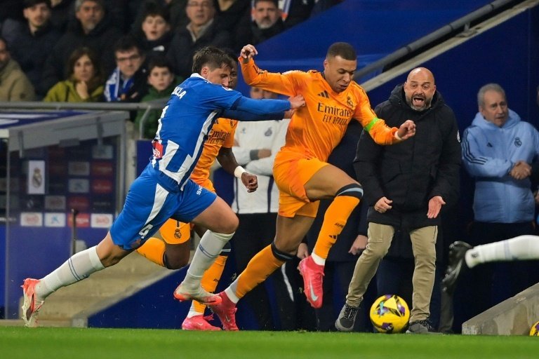 Real Madrid stumbled to a shock 1-0 defeat at struggling Espanyol on Sunday which left them leading La Liga by a single point.