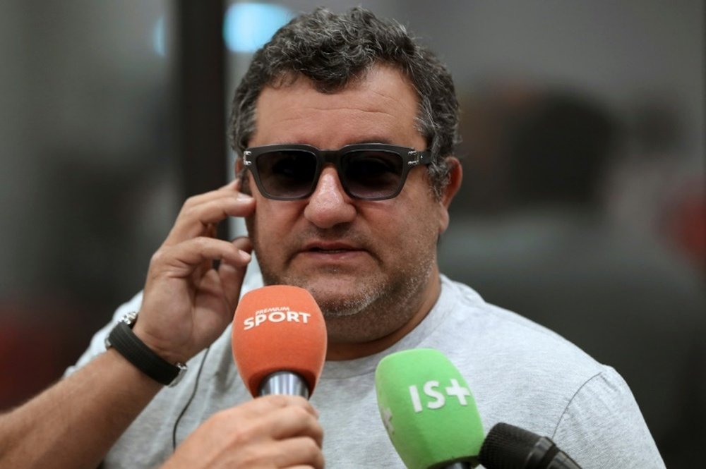 Mino Raiola's ban is now a global one. AFP