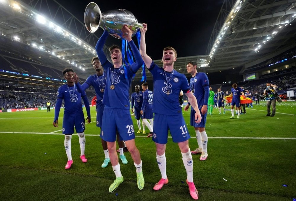 Chelsea's German stars Havertz (L front) and Werner (R front) tasted UCL success this season. AFP