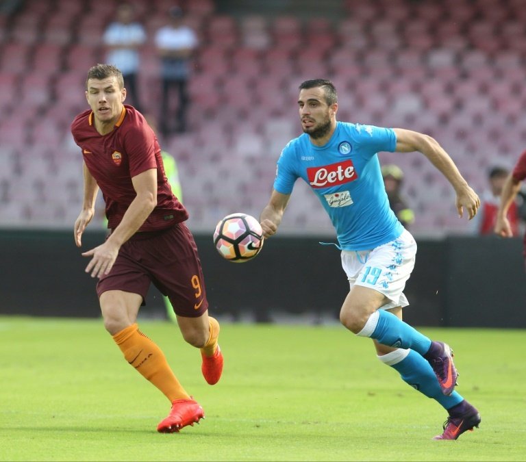 Dzeko hits brace as Roma dent Napoli scudetto hopes