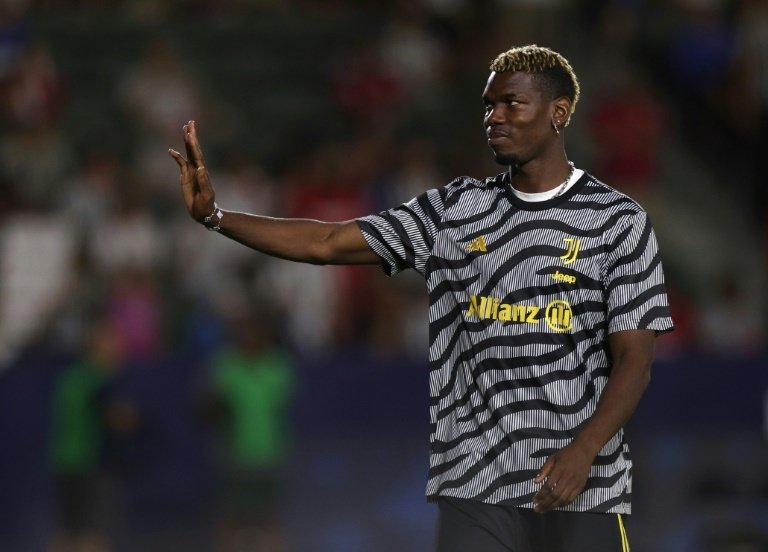 Paul Pogba has been handed a four-year ban from football for doping. AFP