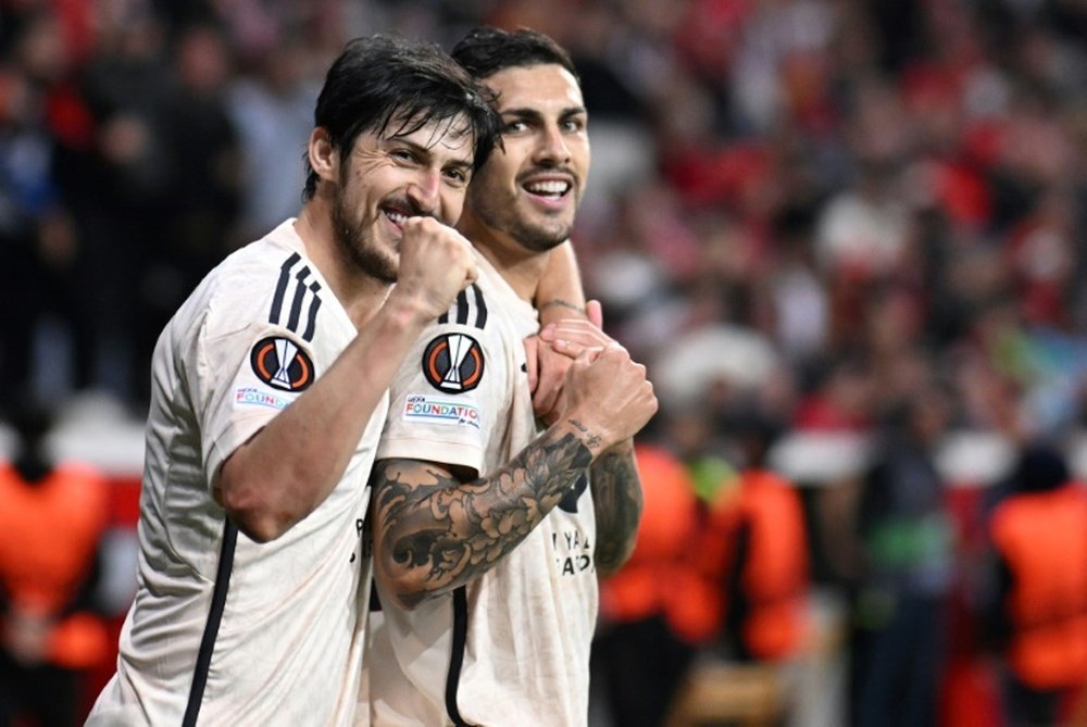 Sardar Azmoun (L) has left Bayer Leverkusen for Dubai club Shabab Al-Ahli. AFP