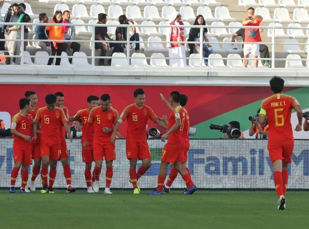 China saved by goalie howler in narrow win over Kyrgyzstan. AFP