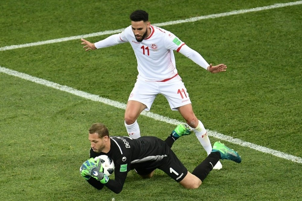 Farouk Ben Mustapha (L) was the hero in the penalty shootout. AFP