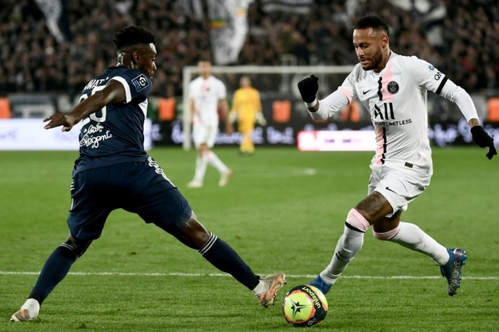 Neymar torments Bordeaux defender Enock Kwateng. AFP