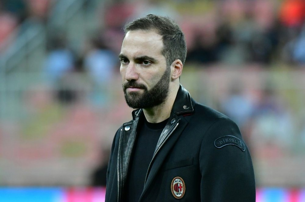 Higuain is reportedly edging closer to the Premier League. AFP
