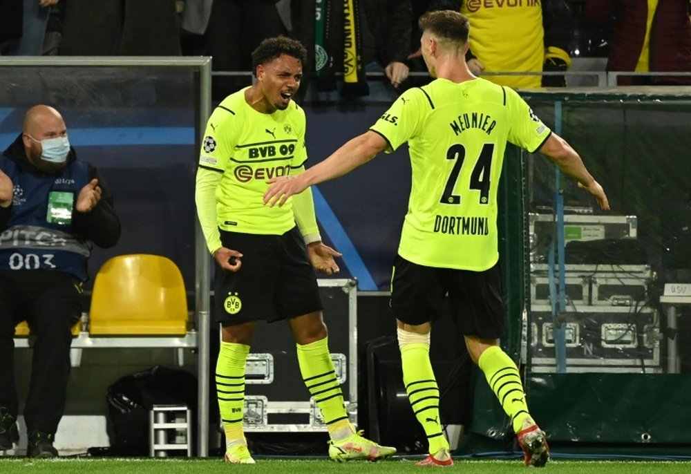Donyell Malen (L) as Dortmund beat Sporting in Haaland's absence. AFP