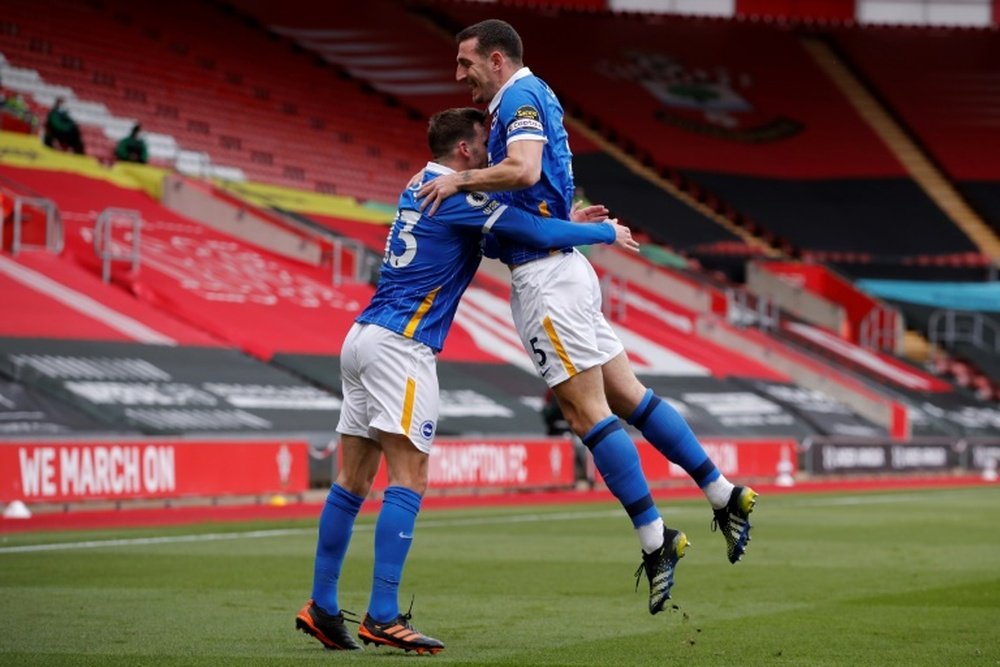 Lewis Dunk (R) scored as Brighton beat Southampton. AFP