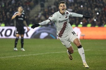 Patrik Schick headed Bayer Leverkusen level in stoppage time for a 2-2 draw at Qarabag in the Europa League on Thursday, extending their unbeaten run to 35 games.