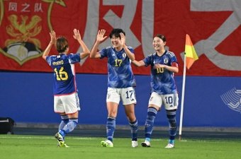 Japan held off a furious second-half fightback from hosts China in the Asian Games women's football semi-finals on Tuesday to win 4-3 and set up a gold-medal showdown with North Korea.