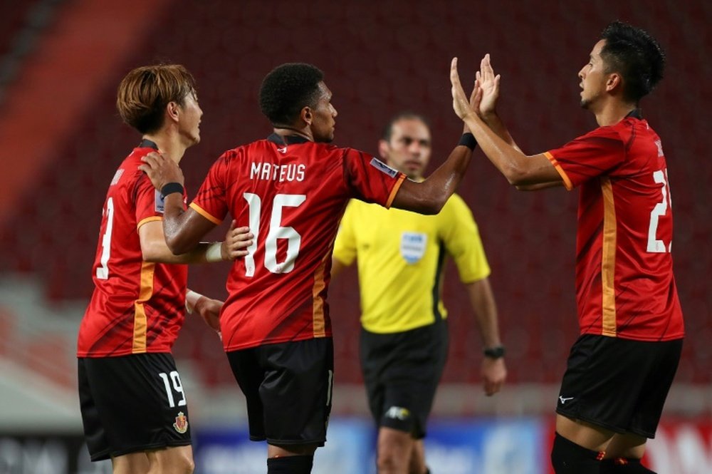 Nagoya Grampus Mateus Castro (C) celebrates after scoring against Ratchaburi. AFP