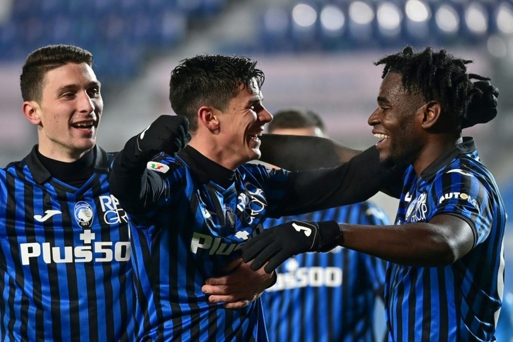 Matteo Pessina (C) and Duvan Zapata (R) scored in Atalanta's 3-1 win over Napoli. AFP